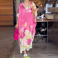Vestido largo holgado con estampado floral y media manga