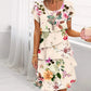 Vestido en cascada con motivos florales y varias plantas