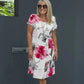 Vestido en cascada con motivos florales y varias plantas